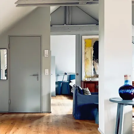 Above The Roofs Of *